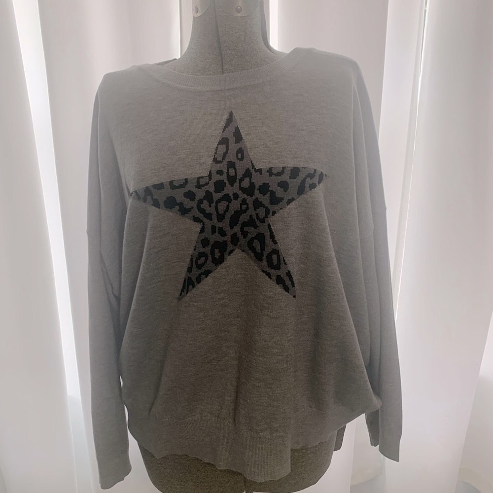 Size 2X sweater with cute leopard print star. Brand new without tags